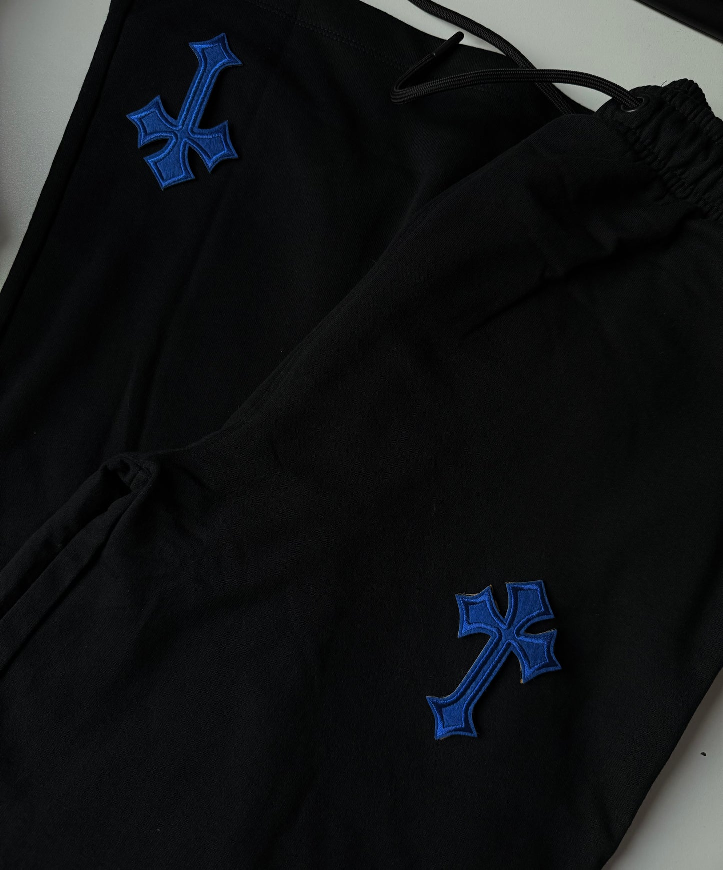 ‘CROSSED OUT’ CUSTOMISABLE WIDE LEG JOGGERS